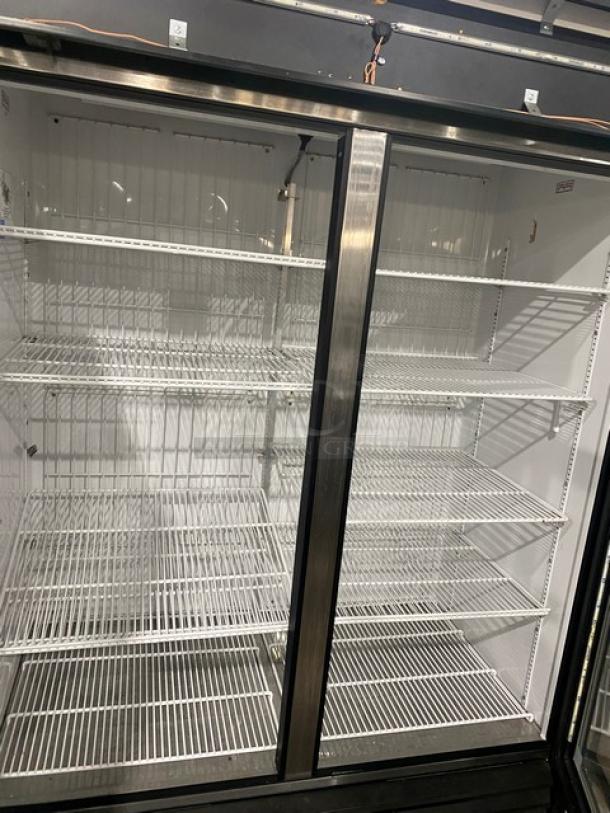 True commercial double glass door freezer, model GDM-49F-LD. Energy Star certified, on casters, with poly-coated wire racks.