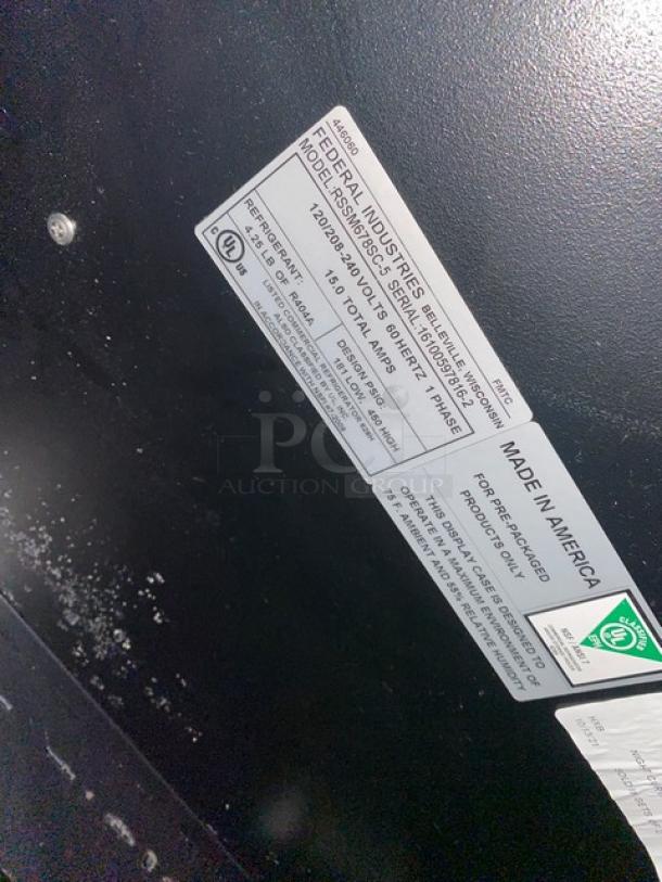 Federal Industries commercial black refrigerated display case with model RSSM678SC5 label, 120/208-240V, 1 Phase.