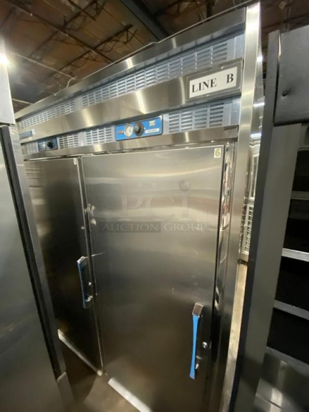 Victory stainless steel 2-door roll-thru heated holding cabinet with dual compartment controls, shown in clean condition.