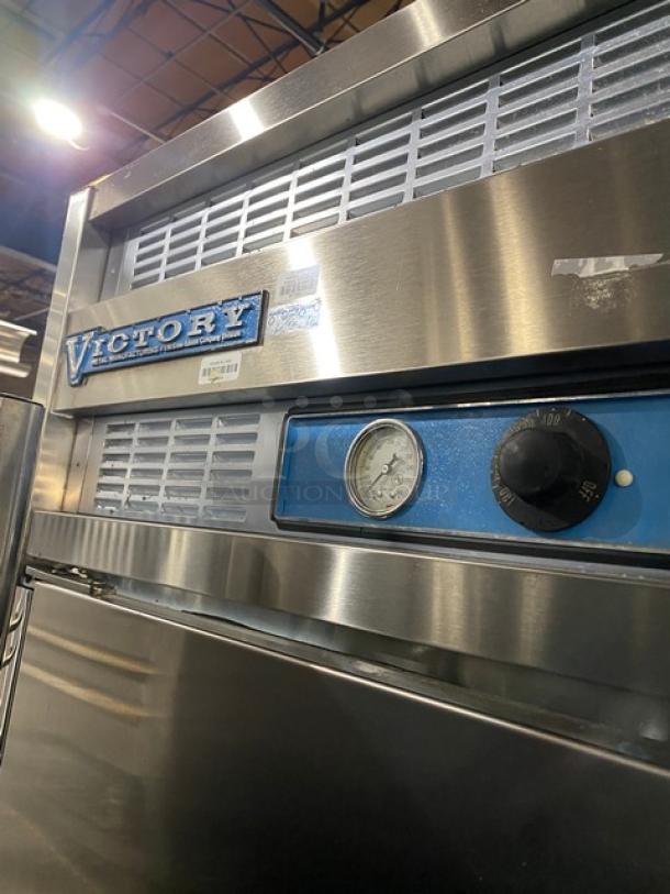 Victory stainless steel 2-door roll-thru heated holding cabinet, dual compartment controls, thermometer, VG condition.