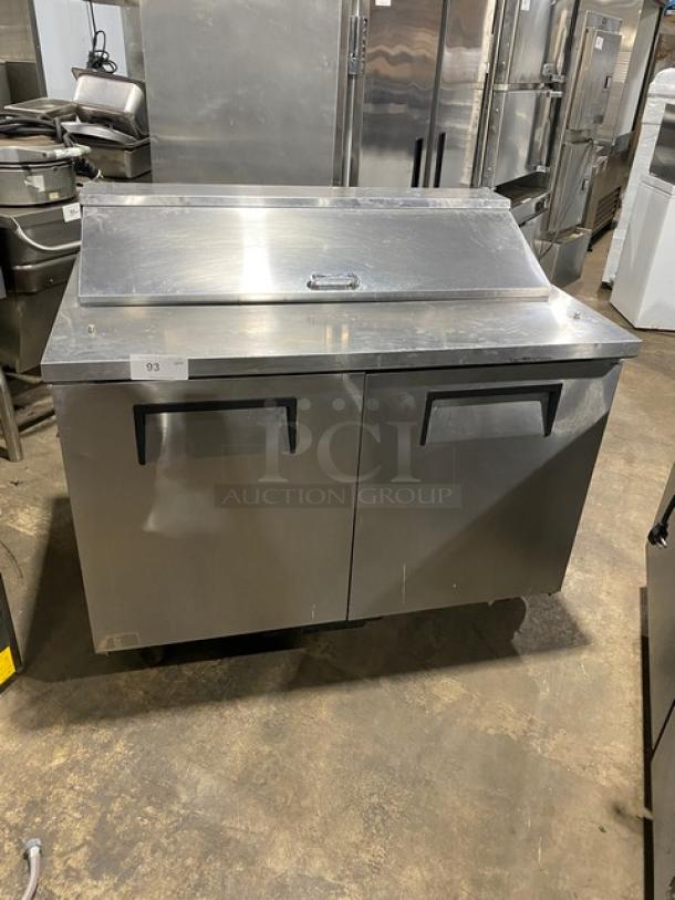 True TSSU-48-12 stainless steel prep table; 2-door, refrigerated, bain marie style, on casters, model number visible.