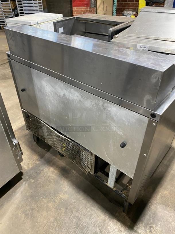 True Commercial 2-Door Stainless Steel Prep Table, Model TSSU4812, on casters, 115V, showing back panel, fair condition.