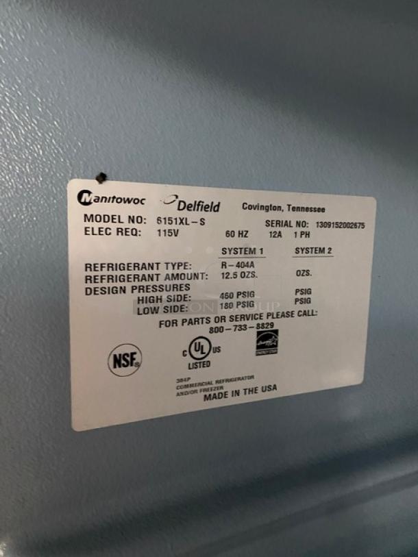 Delfield 6000XL Series commercial 2-door stainless steel freezer, Model 6151XL-S, Energy Star certified, with poly-coated wired rack, on casters.