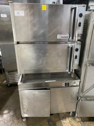 Cleveland Range Pro-XVI Series stainless steel dual compartment 16-pan convection steamer. Model 36CGM16300, natural gas, 115V 1 phase.