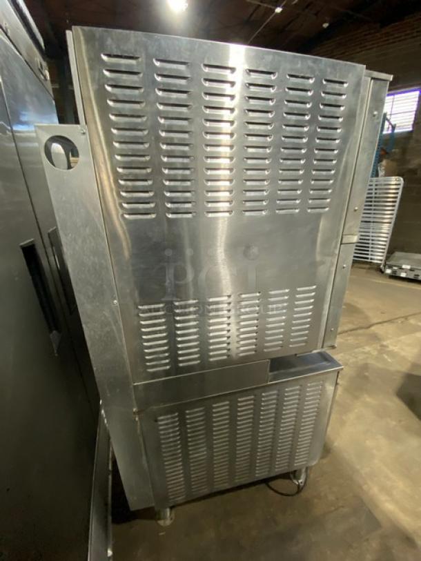 Cleveland Range Pro-XVI 36CGM16300 stainless steel convection steamer, dual compartment, 16-pan capacity, on legs, natural gas powered.