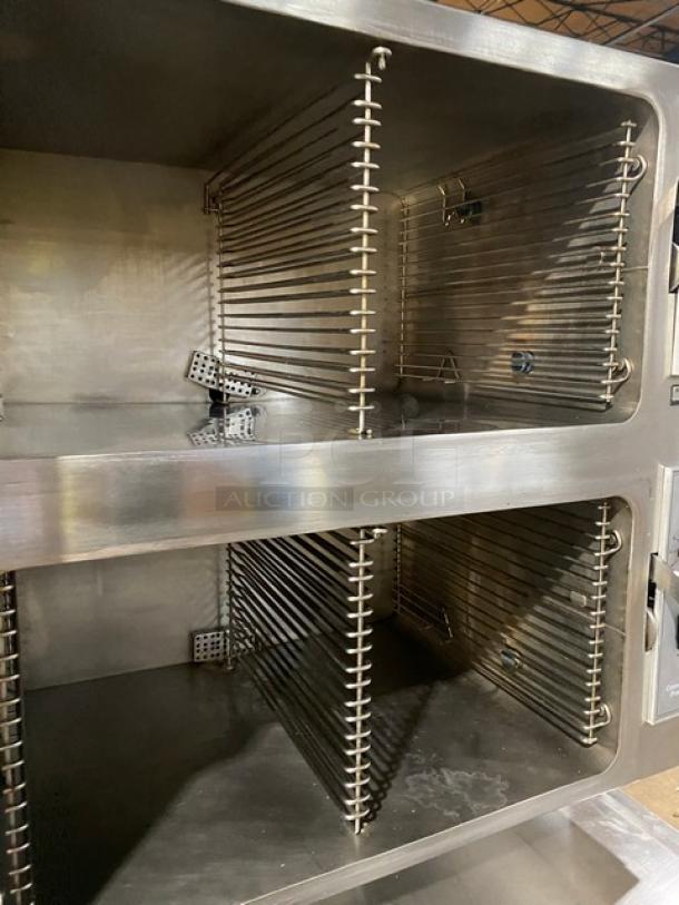Cleveland Range 36CGM16300 dual compartment 16-pan convection steamer cabinet in stainless steel. Natural gas powered, on legs.