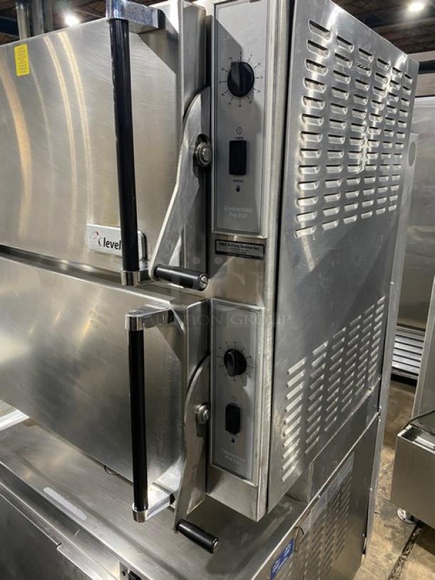 Cleveland Range Pro-XVI Series commercial stainless steel dual compartment 16-pan convection steamer, Model 36CGM16300, natural gas, 115V 1 Phase, on legs.