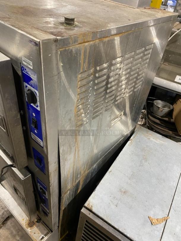 Cleveland Range 24CGA10 commercial dual compartment 10-pan convection steamer in stainless steel. Natural gas, 120V, on legs, with individual controls.