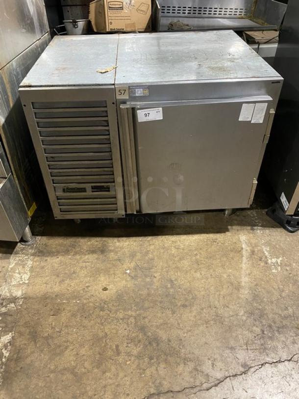 Traulsen UC1LT stainless steel single door undercounter freezer with chrome-plated wire rack, model UC1LT, 115V, on legs.