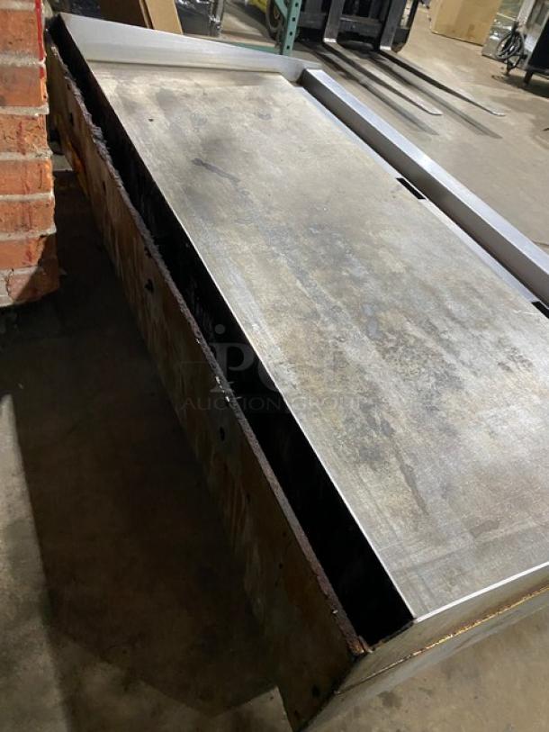 Vulcan stainless steel natural gas countertop griddle with thermostatic control, back and side splash, on legs, used condition.