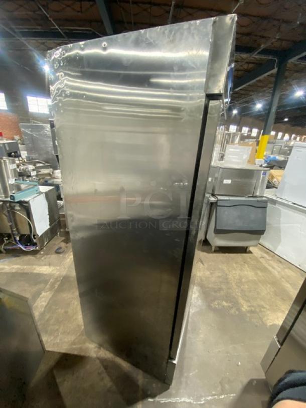 Asber ARF23HFHC stainless steel reach-in freezer, single door, with poly-coated wire rack. Serial: 8103008864. Good condition.