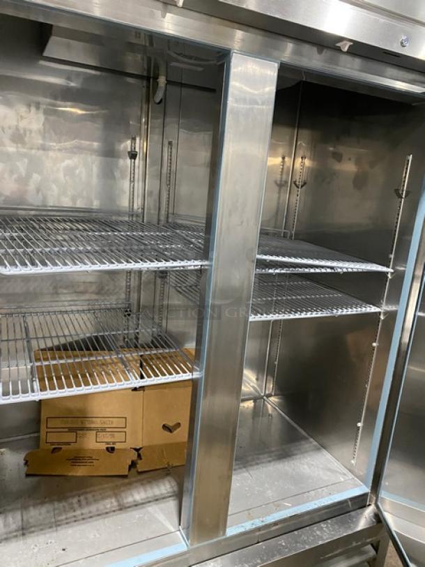 Kelvinator Commercial 2 Door Reach-In Freezer, Model KCHRI54R2DFE, stainless steel, poly-coated wired racks, on casters.