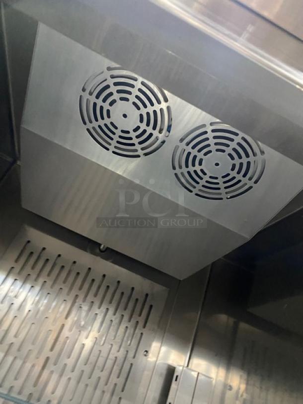 Kelvinator Commercial Stainless Steel Single Door Freezer, Model KCBM23FSE, Energy Star, with poly-coated rack and casters.