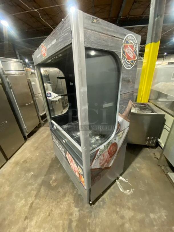 Ojeda ALPA120G2 refrigerated merchandiser, Dietz & Watson style, vertical open display, 120V, 1 Phase, good condition.