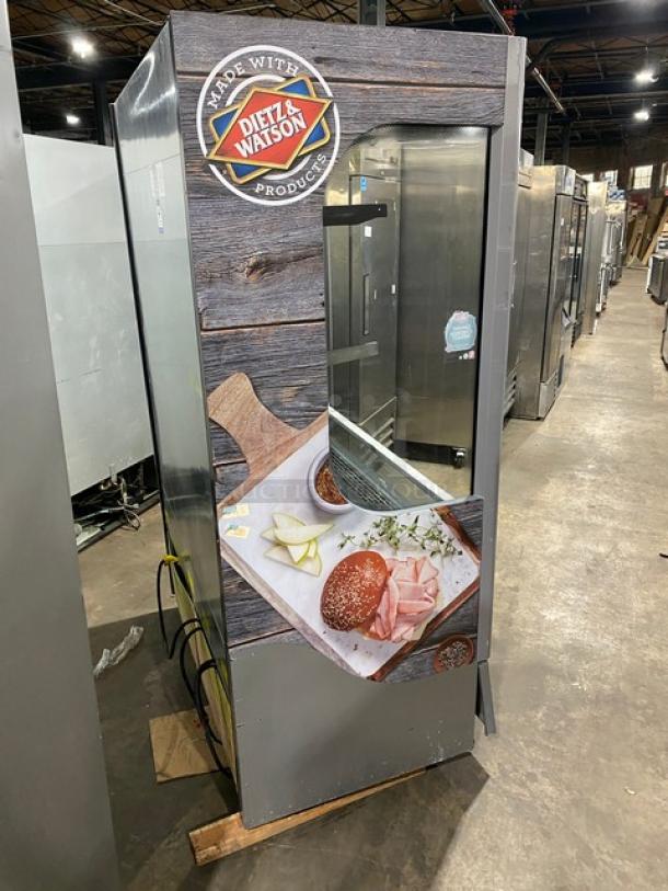 Ojeda ALPA-120 G2 refrigerated vertical open display case, Dietz & Watson branding, 120V, used condition. Ideal for grab-n-go.