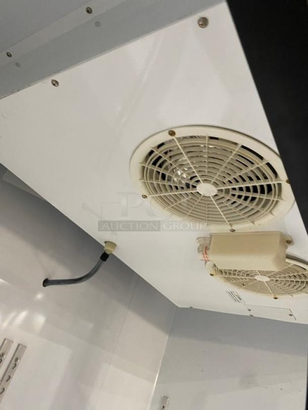 Beverage-Air KF48-1AS commercial freezer interior with dual fans, white finish. Model: KF48-1AS, SN: BF48012089, 115V.