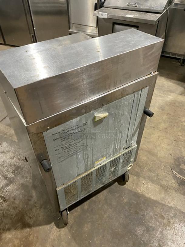 Beverage-Air SPE27 refrigerated prep table, stainless steel, single door, bain marie style, on casters, used condition.