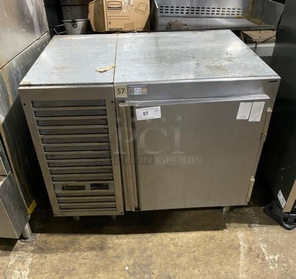 Traulsen UC1LT stainless steel undercounter freezer, single door, chrome rack, on legs, Model SN: T56617F07, 115V 1 Phase.