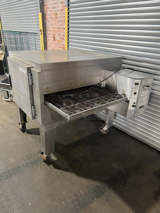 Lincoln Impinger 1451 Commercial Conveyor Oven, stainless steel, liquid propane, FastBake, on casters, used condition.