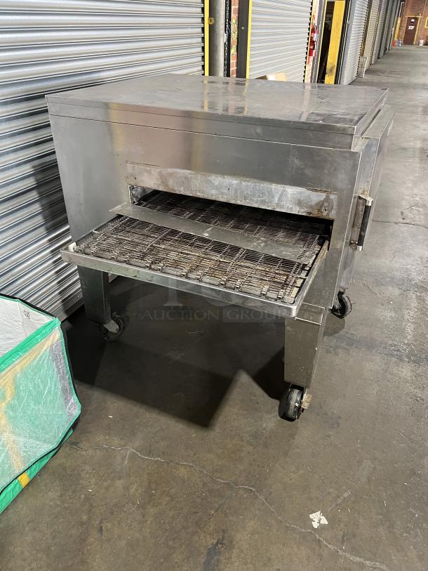 Lincoln Impinger 1451 conveyor oven, stainless steel, liquid propane, on casters, model 1451, SN: 5580, 120V 1 phase.