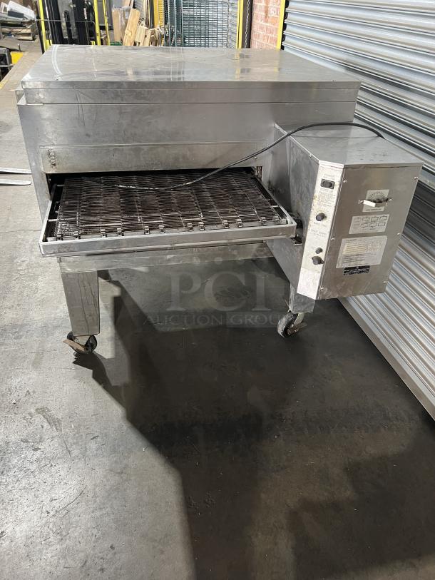 Lincoln Impinger 1451 commercial stainless steel conveyor oven, liquid propane powered, on casters, model 1451 SN: 5580.