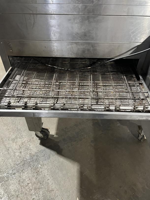 Lincoln Impinger 1451 commercial stainless steel conveyor oven, liquid propane, model 1451, SN 5580, on casters, 120V 1 Phase.