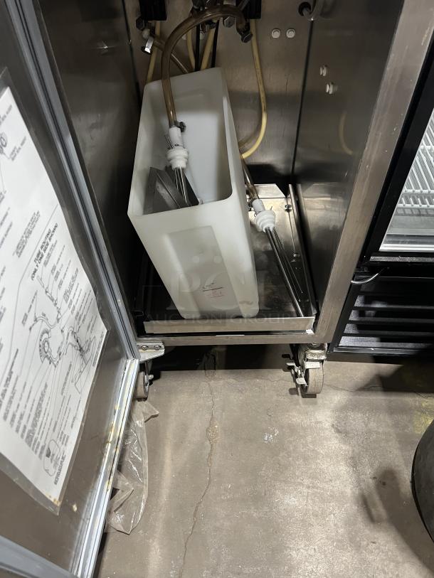 Stoelting commercial soft serve machine, model O43110912FR, stainless steel, with drip tray and casters, 208-240V 3-phase.