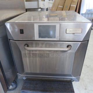 Merry Chef Eikon E4 countertop convection oven, stainless steel, 208/240V, 23x28x23 inches, touchscreen display, great condition.