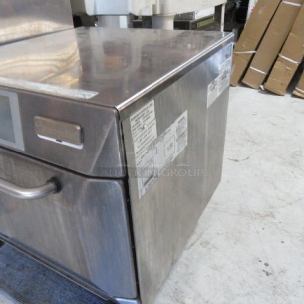 Merry Chef Eikon E4 hi-speed convection oven, stainless steel, model Eikon e4, 23x28x23 inches, 208/240V, visible labels.