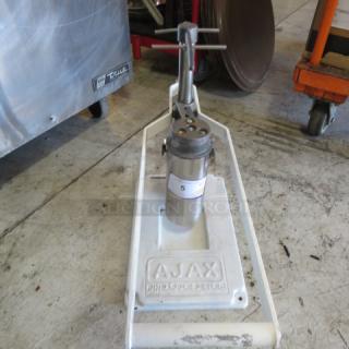 AJAX Pineapple Peeler, sturdy metal, white, good condition, base marked with brand and model, auction item priced at $965.80.