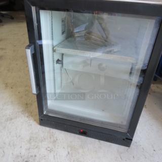 New Aegis Model 2-F-5 glass display freezer with 1 door, includes 3 racks and keys. Measures 23x25x30.5 inches. 115 Volt.