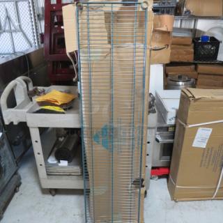 NEW 60x14 green Metro shelf, in packaging, from METRO. Appears pristine, ideal for storage solutions. Model: 2XBID.