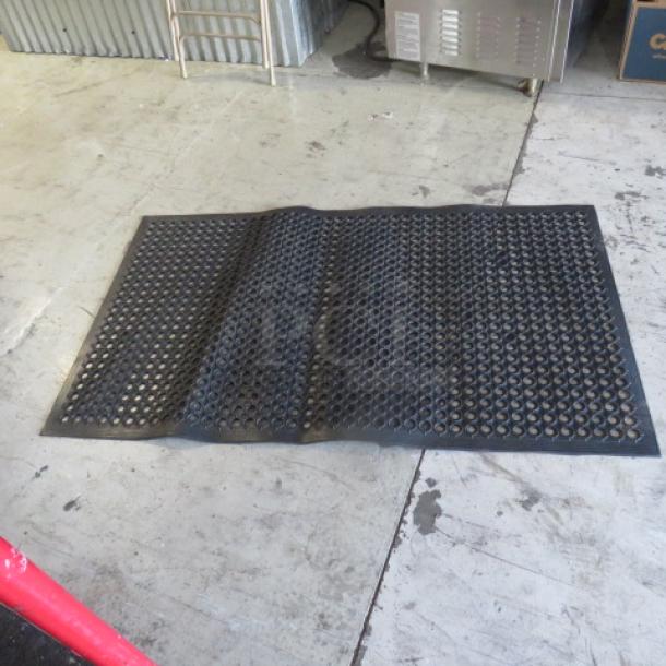 New 60x36 fatigue mat with anti-fatigue design, black, perforated surface, ideal for reducing fatigue in workspaces.