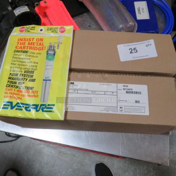 EVERPURE Water Filtration System with caution label and installation instructions; boxed for shipping.