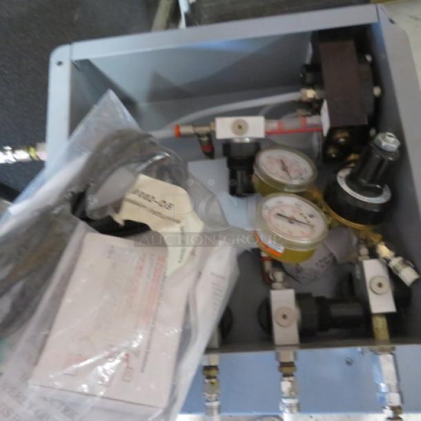 One NUCO2 XACTN2 Draught 4.0 Draft Beer System, Model ND-01-01, includes gauges and wiring, 120 Volt, good condition.