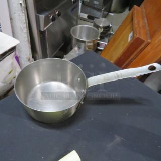 Vollrath 2 Quart Sauce Pan, Model 78321, stainless steel, sturdy handle. In good condition, ideal for cooking needs.