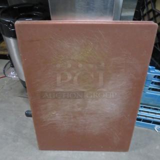 Brown cutting board, 24x18 inches, lightly scratched, durable material, model 2XBID, ideal for kitchen use.