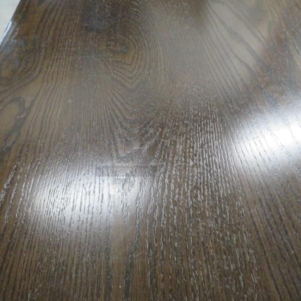 1.5-inch thick solid wooden table top with dark wood grain, part of a 36x30x30 pedestal dining table.