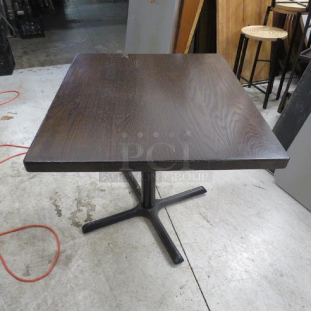 1.5-inch thick solid wooden table with pedestal base, dimensions 36x30x30 inches, in good condition.