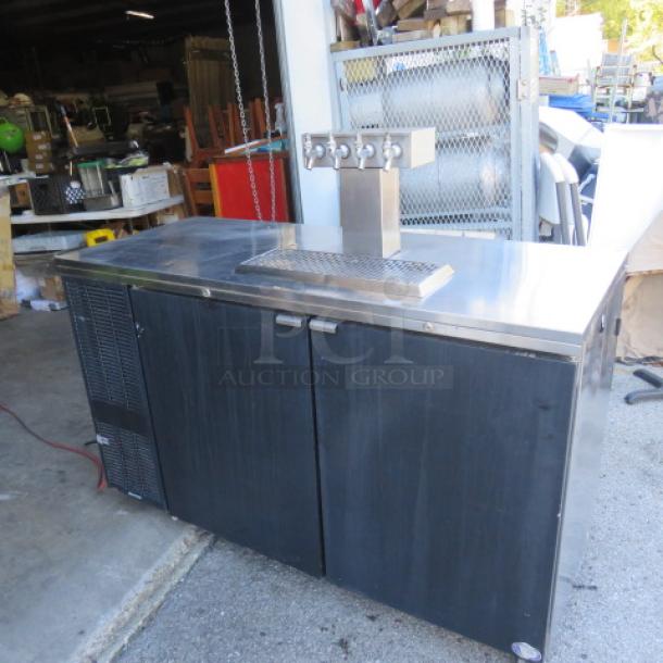 Perlick 2 Door Keg Box, Model DS60BLT, with stainless steel top, 1 tower, 4 taps, on casters; dimensions 60x25x37 inches.