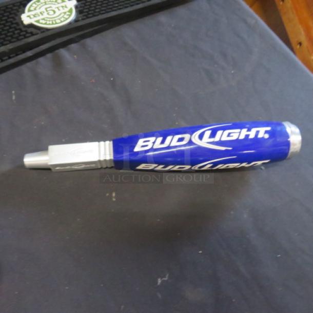 Blue Bud Light beer tap handle with logo, silver accents, good condition.
