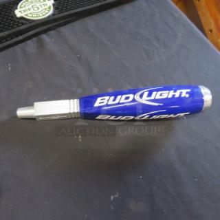 Blue Bud Light beer tap handle with logo, silver accents, good condition.