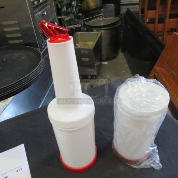 NEW Store And Pour set, includes two white containers with red spouts, one wrapped in plastic. Perfect for liquid storage.