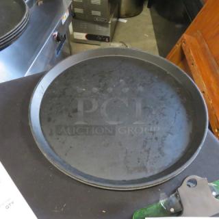 16-inch black waitress tray, round, with slight wear marks, suitable for serving; labeled "3XBID".