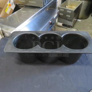 Black three-slot bottle holder, sturdy plastic, good condition, suitable for commercial use.