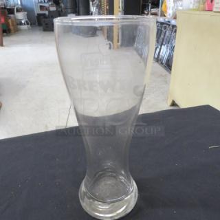XL Pilsner beer glass with "Brew" engraving, model 12XBID. Clear glass, good condition, ideal for beer enthusiasts.