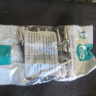 Lot of 12 new pourers in original packaging, Ideal for liquor or syrup bottles. Includes usage instructions and "True" branding.