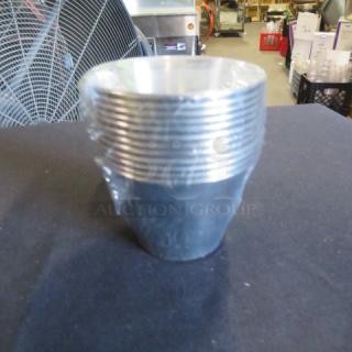 12 new stainless steel condiment cups, stacked and wrapped in plastic. Ideal for food service, pristine condition.