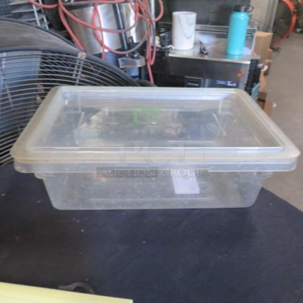 Cambro 3-gallon food storage container with lid, transparent, rectangular, used condition. Ideal for kitchen storage.