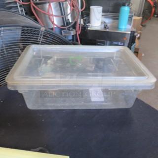 Cambro 3-gallon food storage container with lid, transparent, rectangular, used condition. Ideal for kitchen storage.